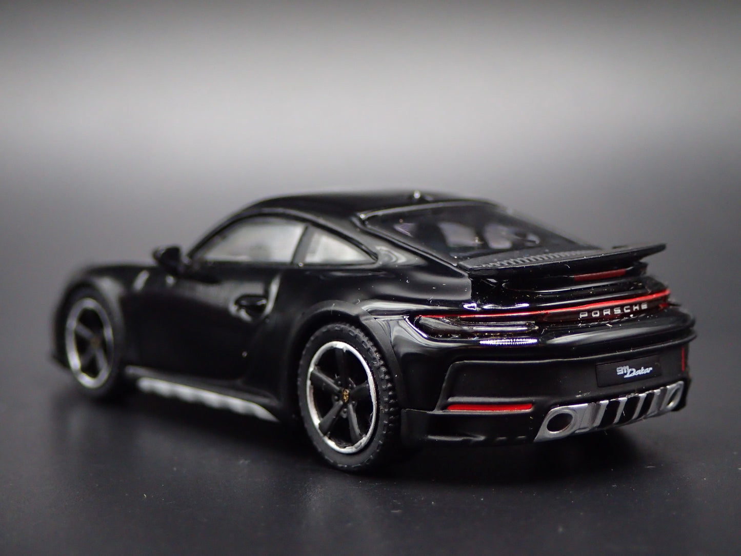 PORSCHE 911 DAKAR RALLYE OFF ROAD BLACK 1/64 SCALE COLLECTIBLE DIECAST MODEL CAR