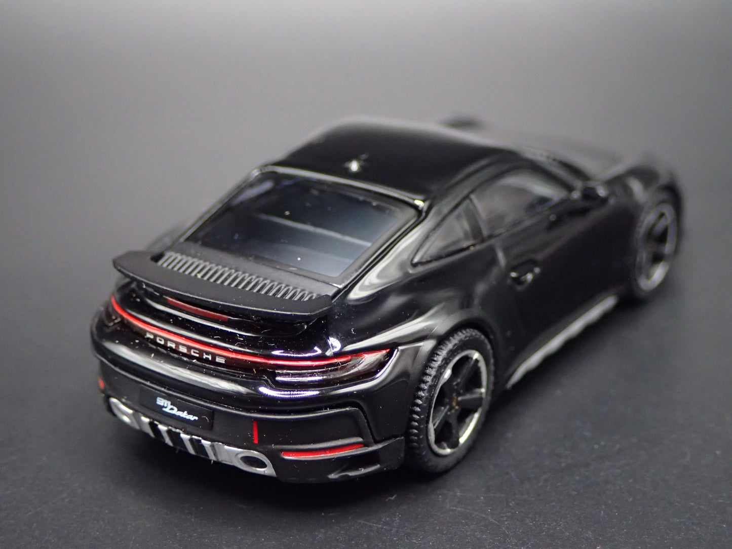 PORSCHE 911 DAKAR RALLYE OFF ROAD BLACK 1/64 SCALE COLLECTIBLE DIECAST MODEL CAR