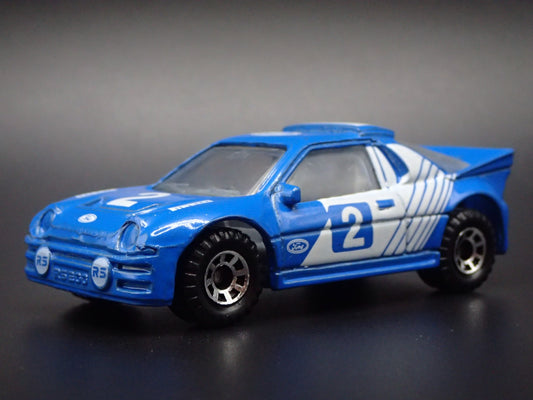 1984-1986 FORD RS 200 RACE CAR 1:64 SCALE COLLECTIBLE DIORAMA DIECAST MODEL CAR