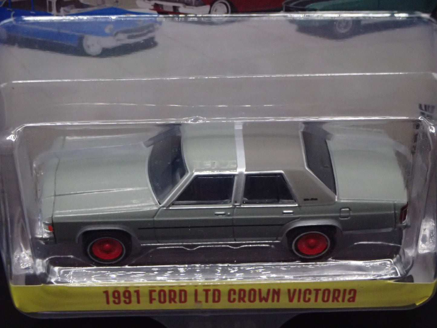 2025 GREENLIGHT RED CHASE GREEN MACHINE 1991 FORD LTD CROWN VIC SHOWROOM FLOOR 6