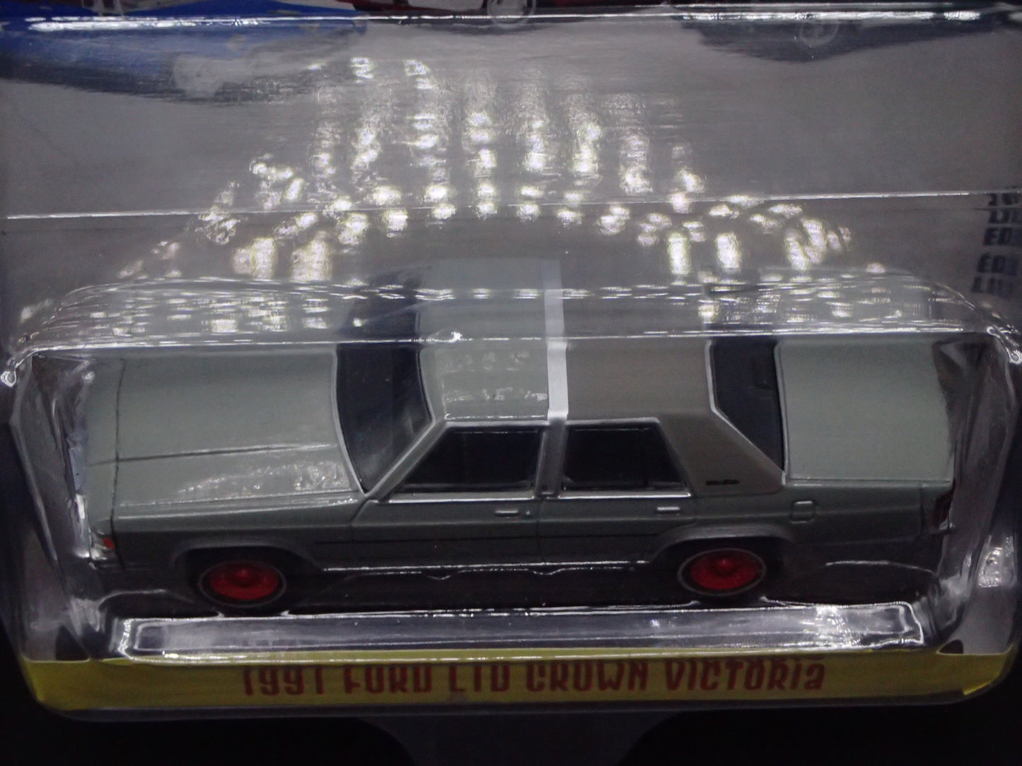 2025 GREENLIGHT RED CHASE GREEN MACHINE 1991 FORD LTD CROWN VIC SHOWROOM FLOOR 6