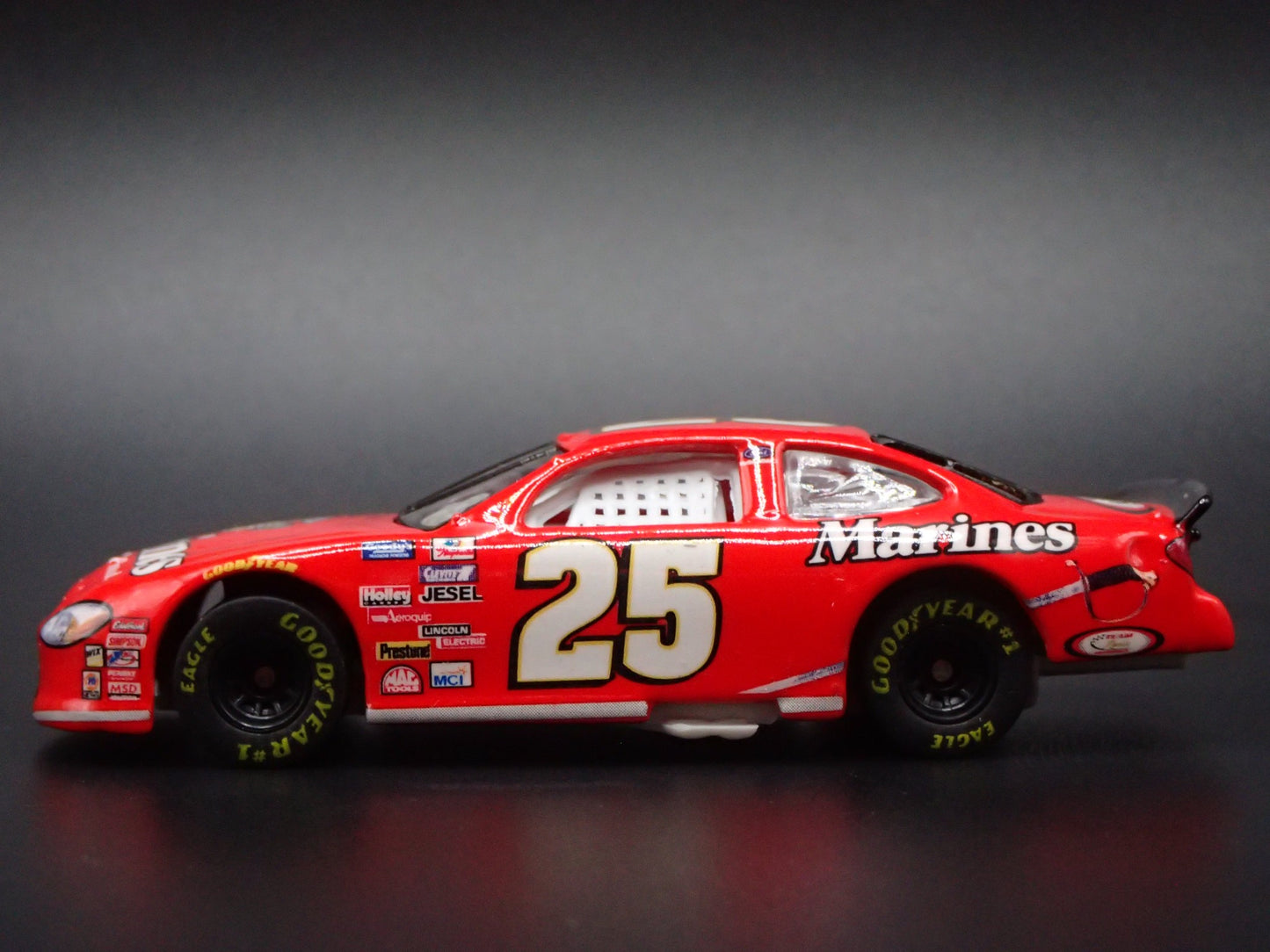 2002 02 FORD TAURUS #25 BOBBY HAMILTON JR MARINES NASCAR 1:64 SCALE DIECAST CAR