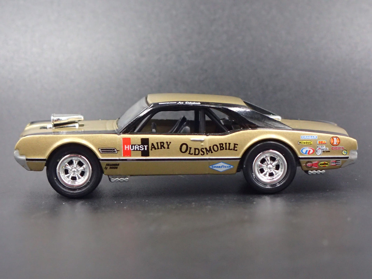 1967 67 OLDS OLDSMOBILE HURST HAIRY GOLD 1:64 SCALE DIORAMA DIECAST MODEL CAR