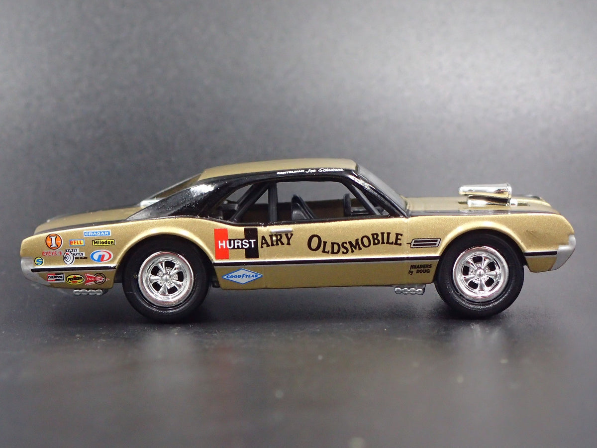 1967 67 OLDS OLDSMOBILE HURST HAIRY GOLD 1:64 SCALE DIORAMA DIECAST MODEL CAR