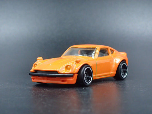 1970-1973 DATSUN 240Z ORANGE 1:64 SCALE COLLECTIBLE DIORAMA DIECAST MODEL CAR