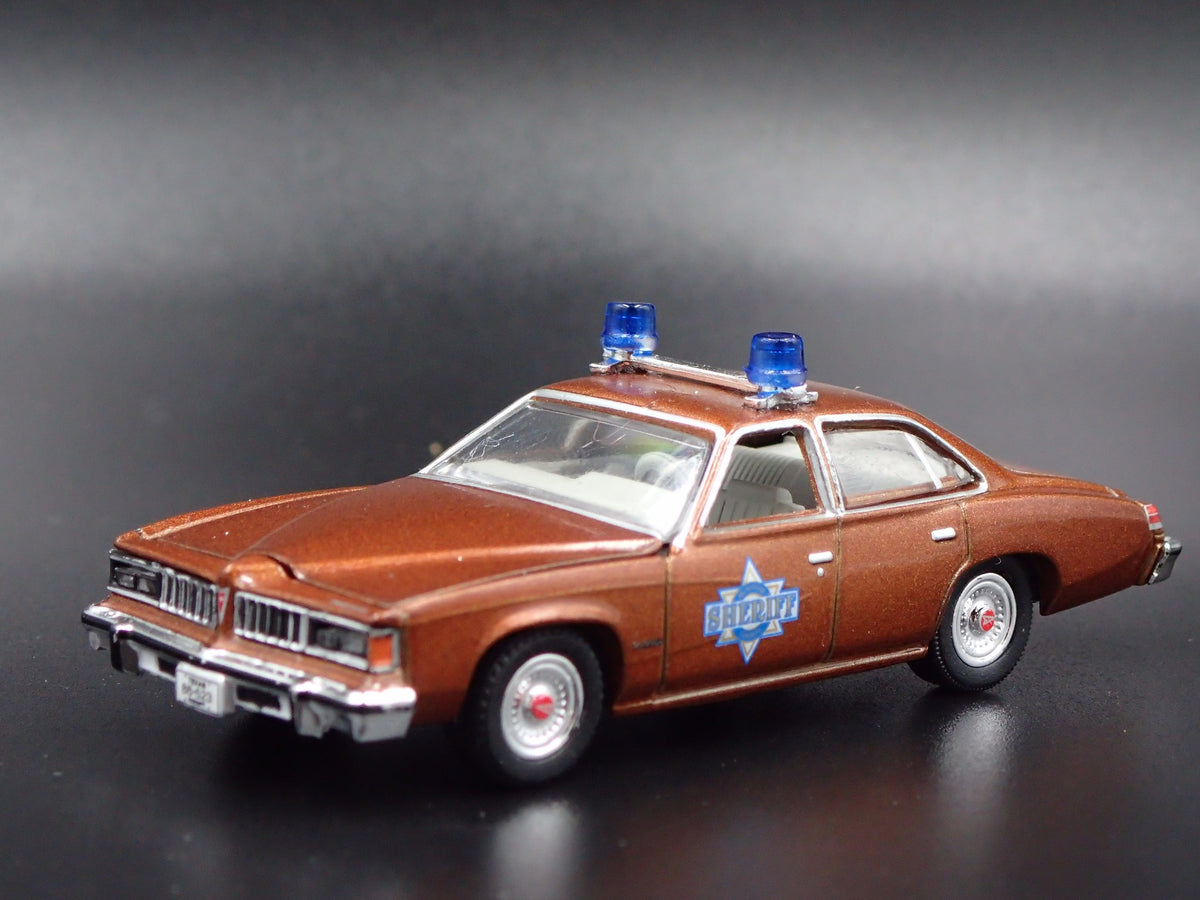 1977 PONTIAC LEMANS SHERIFF BUFORD T JUSTICE SMOKEY & THE BANDIT 1/64 MODEL CAR-Burning Rubber Toy Company