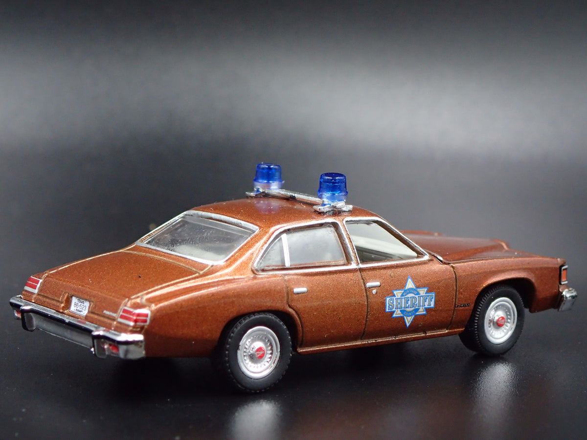 1977 PONTIAC LEMANS SHERIFF BUFORD T JUSTICE SMOKEY & THE BANDIT 1/64 MODEL CAR-Burning Rubber Toy Company