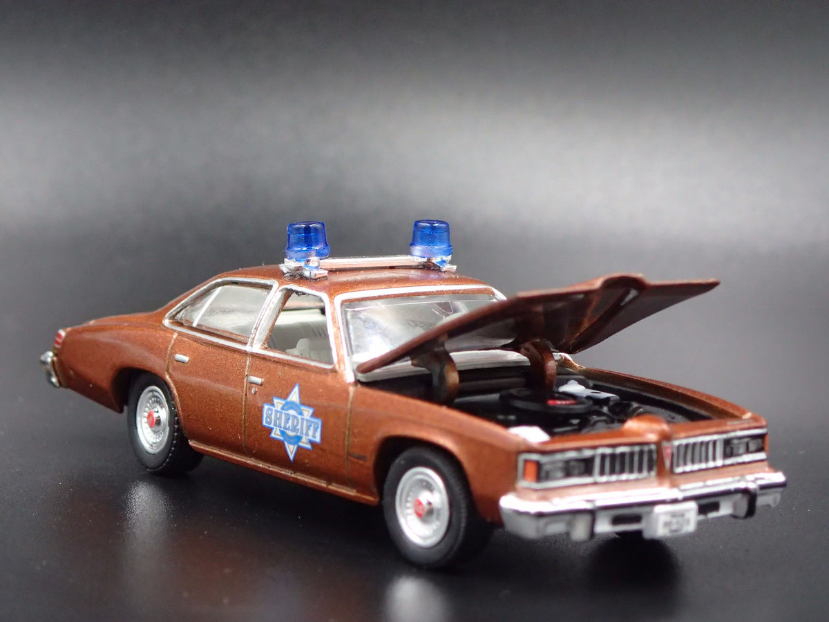 1977 PONTIAC LEMANS SHERIFF BUFORD T JUSTICE SMOKEY & THE BANDIT 1/64 MODEL CAR-Burning Rubber Toy Company